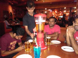 This is a biiiig pitcher of beer. The guys had fun drinking from it.