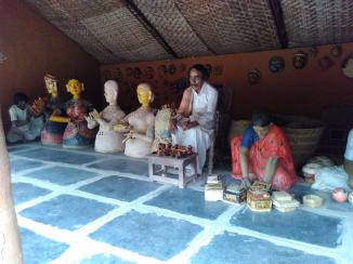 Part of the Rural Museum in Shilparamam. It's a clay model of a artisan creating clay models :-)